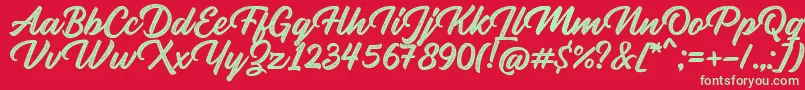 フォントRupture Stamp – 赤い背景に緑の文字