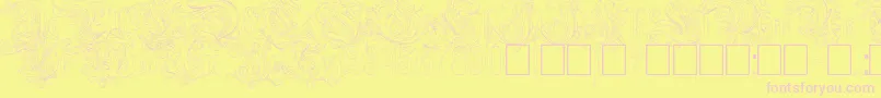 Шрифт Ruritania Outline – розовые шрифты на жёлтом фоне