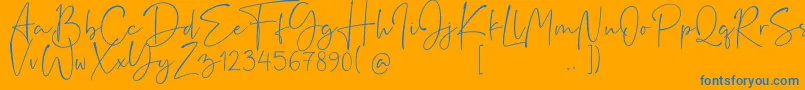 Rushtick Font – Blue Fonts on Orange Background