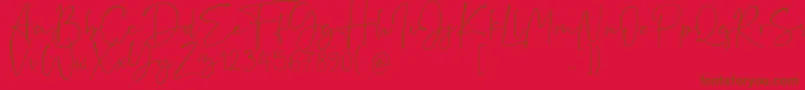 Rushtick Font – Brown Fonts on Red Background