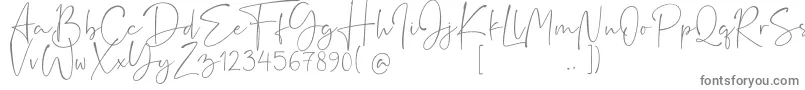 Rushtick-fontti – harmaat kirjasimet valkoisella taustalla