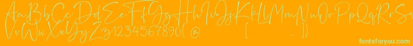 Rushtick Font – Green Fonts on Orange Background