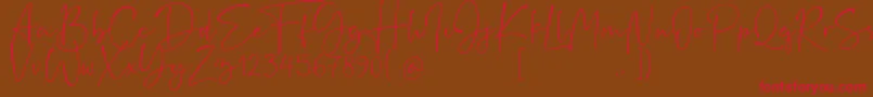 Rushtick Font – Red Fonts on Brown Background