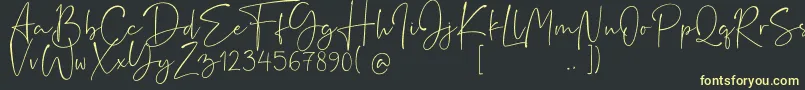Rushtick Font – Yellow Fonts on Black Background