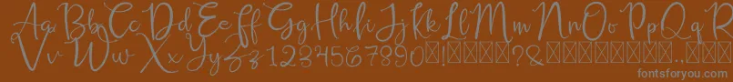 Czcionka RusshellFree – szare czcionki na brązowym tle