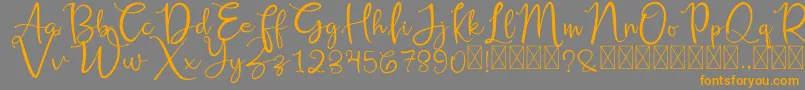 RusshellFree-Schriftart – Orangefarbene Schriften auf grauem Hintergrund