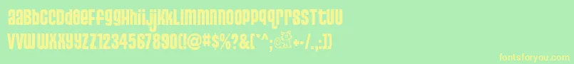 Pusss Font – Yellow Fonts on Green Background