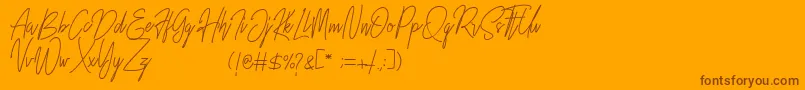 フォントRustic Towns Signature Demo – オレンジの背景に茶色のフォント