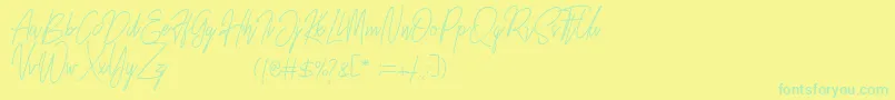 フォントRustic Towns Signature Demo – 黄色い背景に緑の文字