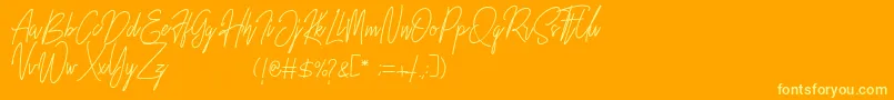 Шрифт Rustic Towns Signature Demo – жёлтые шрифты на оранжевом фоне