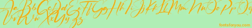 Ruthligos-Schriftart – Orangefarbene Schriften auf grünem Hintergrund