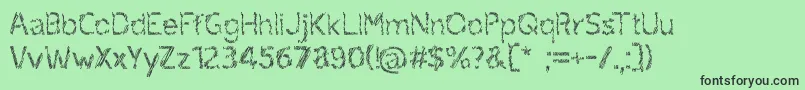 ruxandra Font – Black Fonts on Green Background