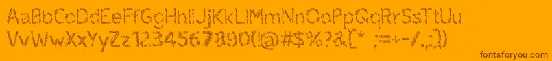 ruxandra Font – Brown Fonts on Orange Background