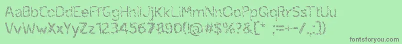 ruxandra Font – Gray Fonts on Green Background
