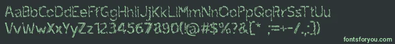ruxandra Font – Green Fonts on Black Background