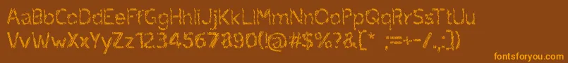 ruxandra Font – Orange Fonts on Brown Background