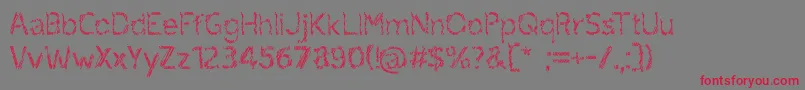 ruxandra-Schriftart – Rote Schriften auf grauem Hintergrund