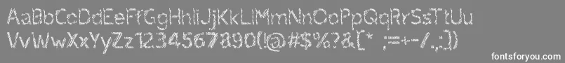 フォントruxandra – 灰色の背景に白い文字