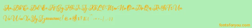 Sabena Font – Orange Fonts on Green Background