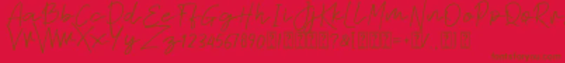 Sabina free-Schriftart – Braune Schriften auf rotem Hintergrund