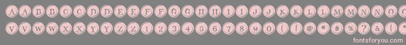 Czcionka TypeKeysFilled – różowe czcionki na szarym tle