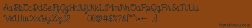 Saffa Script Font – Black Fonts on Brown Background