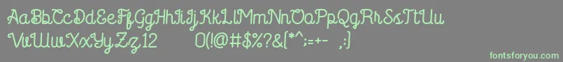 フォントSaffa Script – 灰色の背景に緑のフォント