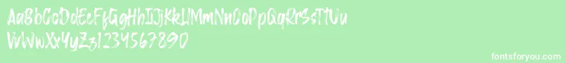 Saggacity Brush-fontti – valkoiset fontit vihreällä taustalla