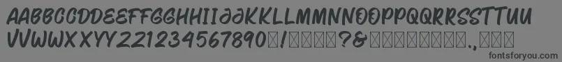 Saghinores-Schriftart – Schwarze Schriften auf grauem Hintergrund