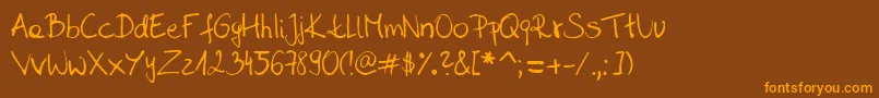 Sahara  s handwriting  D by SaharaKnoblauch Font – Orange Fonts on Brown Background