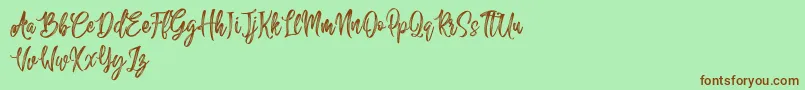 Sailing Heart Free Font – Brown Fonts on Green Background