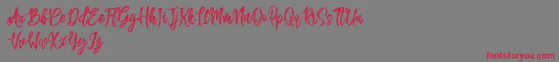 Weitere Informationen zur Sailing Heart Free-Schriftart Sailing Heart Free-Schriftart – Rote Schriften auf grauem Hintergrund