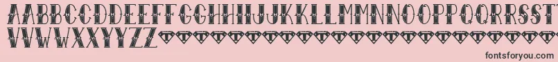 Sailor Larry   Extra Fancy-fontti – mustat fontit vaaleanpunaisella taustalla