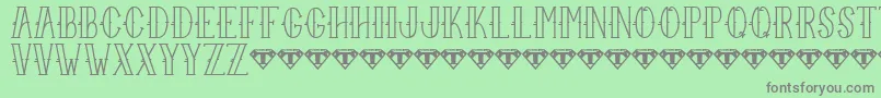 Sailor Larry   Regular-fontti – harmaat kirjasimet vihreällä taustalla