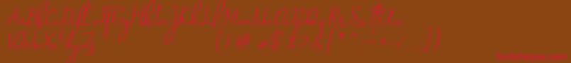 フォントSaint Petersburg   Italic – 赤い文字が茶色の背景にあります。