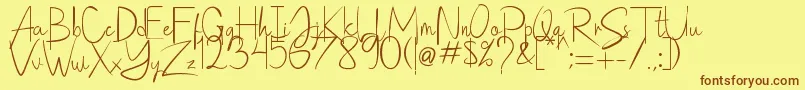 Saithik Handwritten Font – Brown Fonts on Yellow Background
