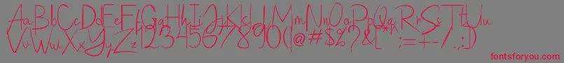 フォントSaithik Handwritten – 赤い文字の灰色の背景