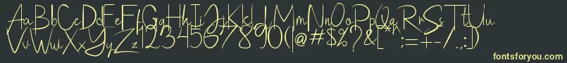 Saithik Handwritten Font – Yellow Fonts on Black Background