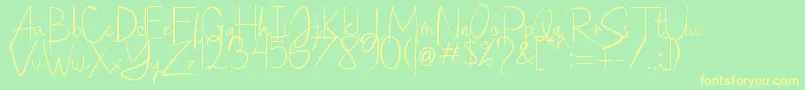 Saithik Handwritten Font – Yellow Fonts on Green Background