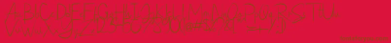 Czcionka saithik – brązowe czcionki na czerwonym tle