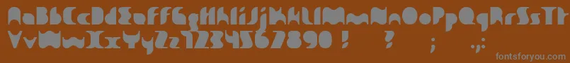 フォントSakiane – 茶色の背景に灰色の文字