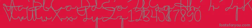 fuente Sakila Script DEMO – Fuentes Grises Sobre Fondo Rojo