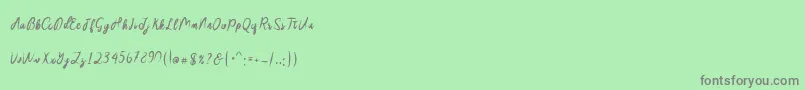 Sakira Script Font – Gray Fonts on Green Background
