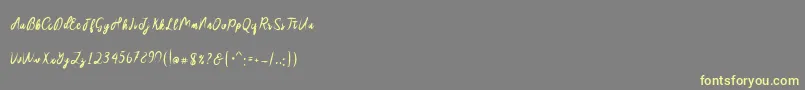 Sakira Script Font – Yellow Fonts on Gray Background