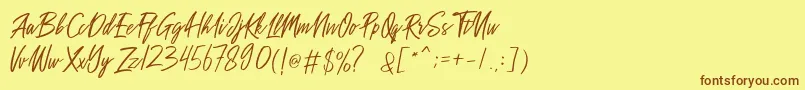 Fonte Sakoda Demo – fontes marrons em um fundo amarelo