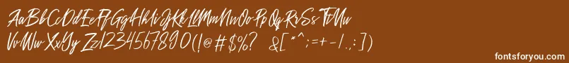 Шрифт Sakoda Demo – белые шрифты на коричневом фоне