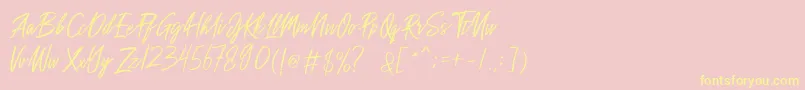 Sakoda Demo-Schriftart – Gelbe Schriften auf rosa Hintergrund