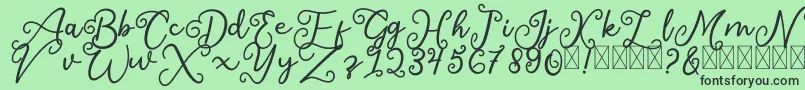 SalaheFree-fontti – mustat fontit vihreällä taustalla