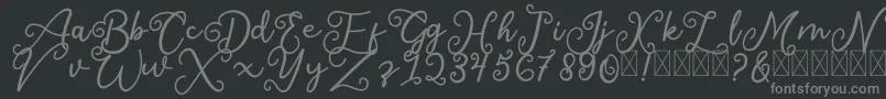 フォントSalaheFree – 黒い背景に灰色の文字