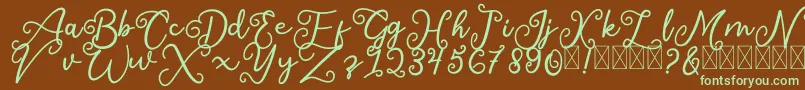 フォントSalaheFree – 緑色の文字が茶色の背景にあります。